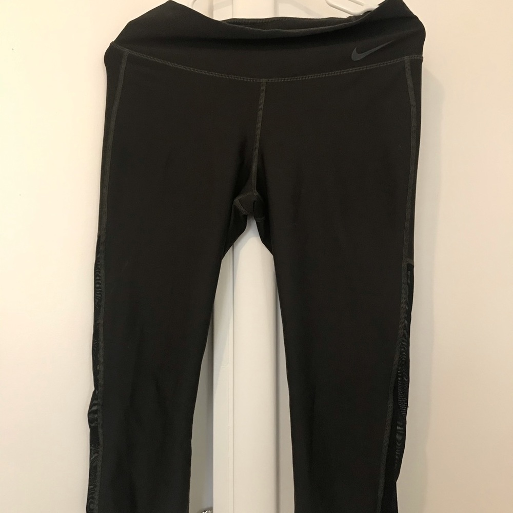 Nike Dri fit capris with mesh on the side